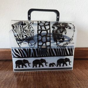 Traffic works inc. Howard R. Mireanue Africa animals clear plastic lunch box USA